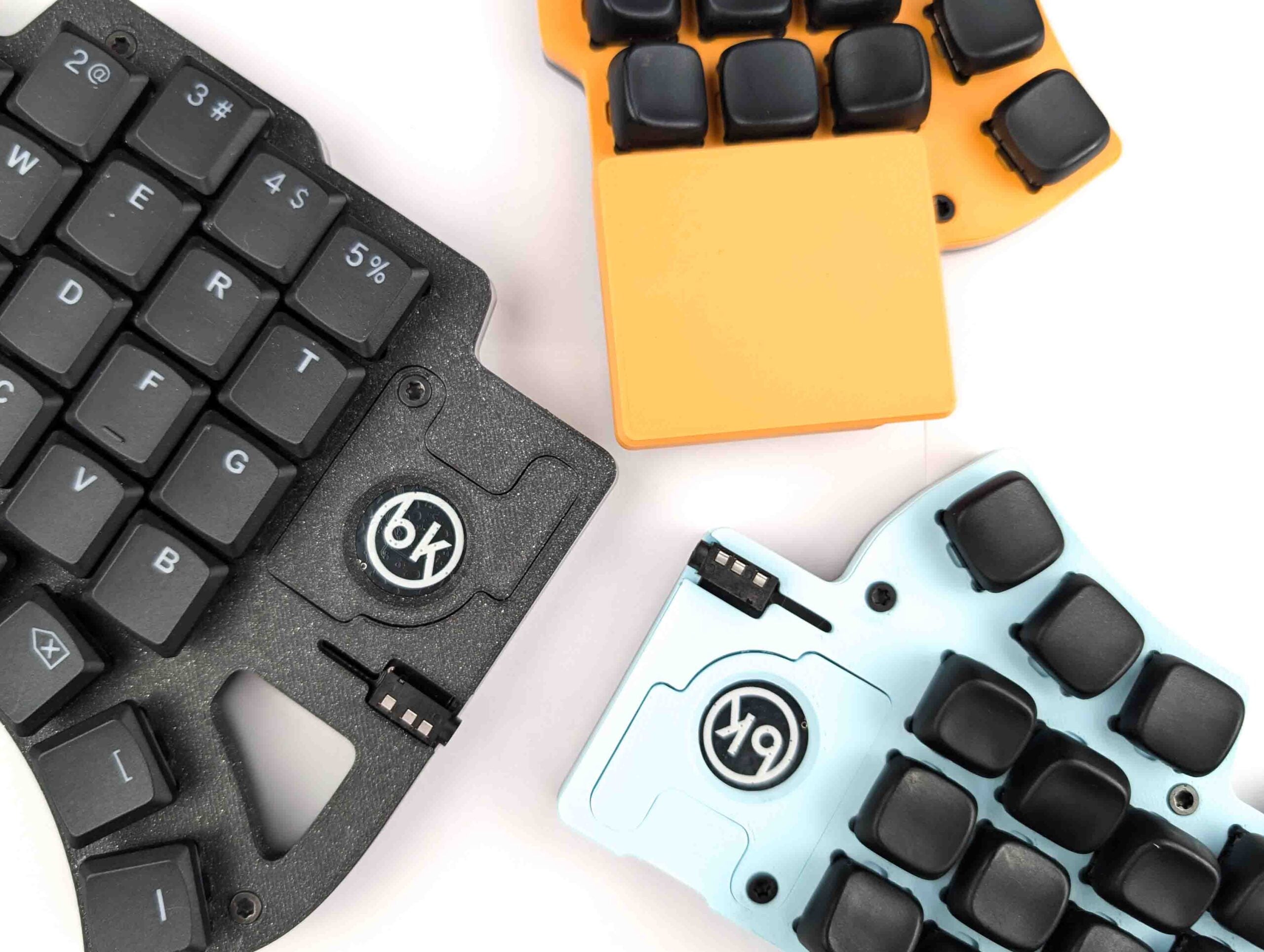 Dilemma - split ergonomic keyboard with trackpad prebuilt